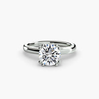 Double Prong Round Solitaire ring
