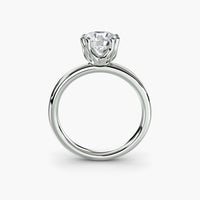 Double Prong Round Solitaire ring