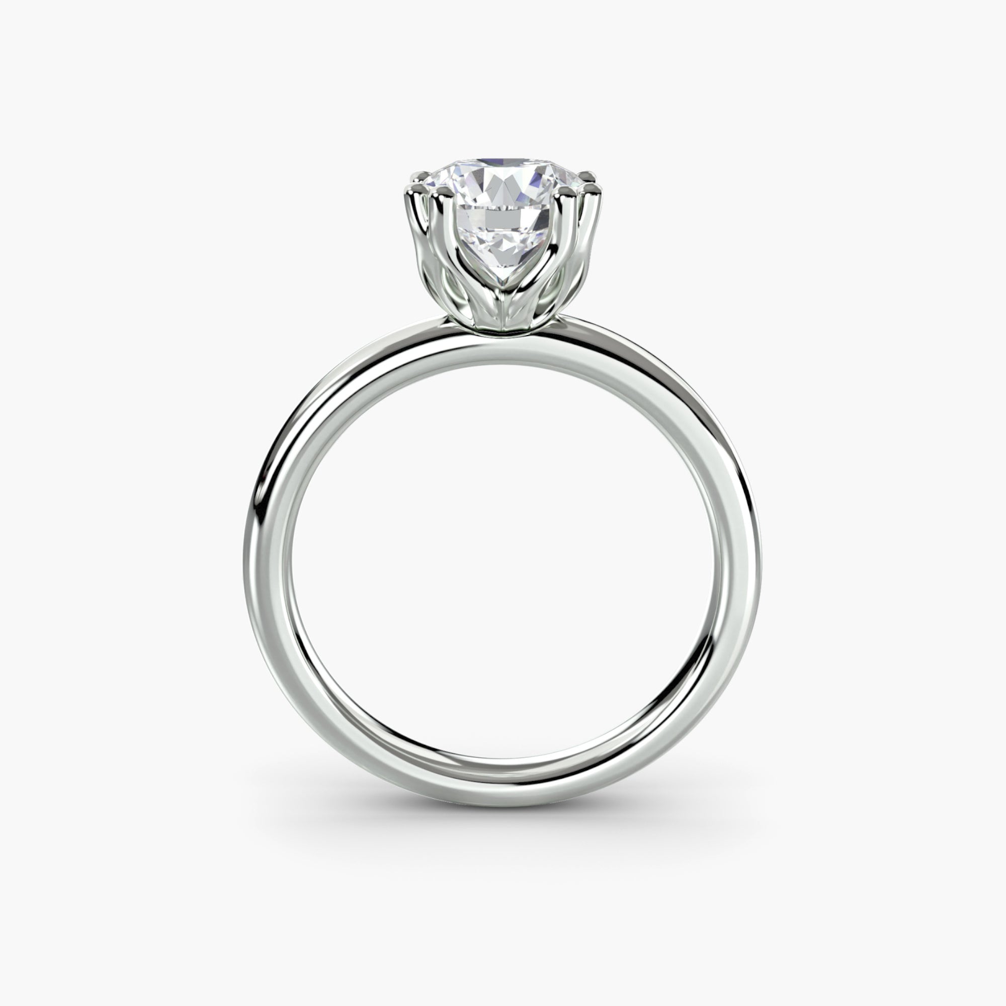 Double Prong Round Solitaire ring