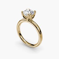 Double Prong Round Solitaire ring