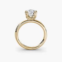 Double Prong Round Solitaire ring