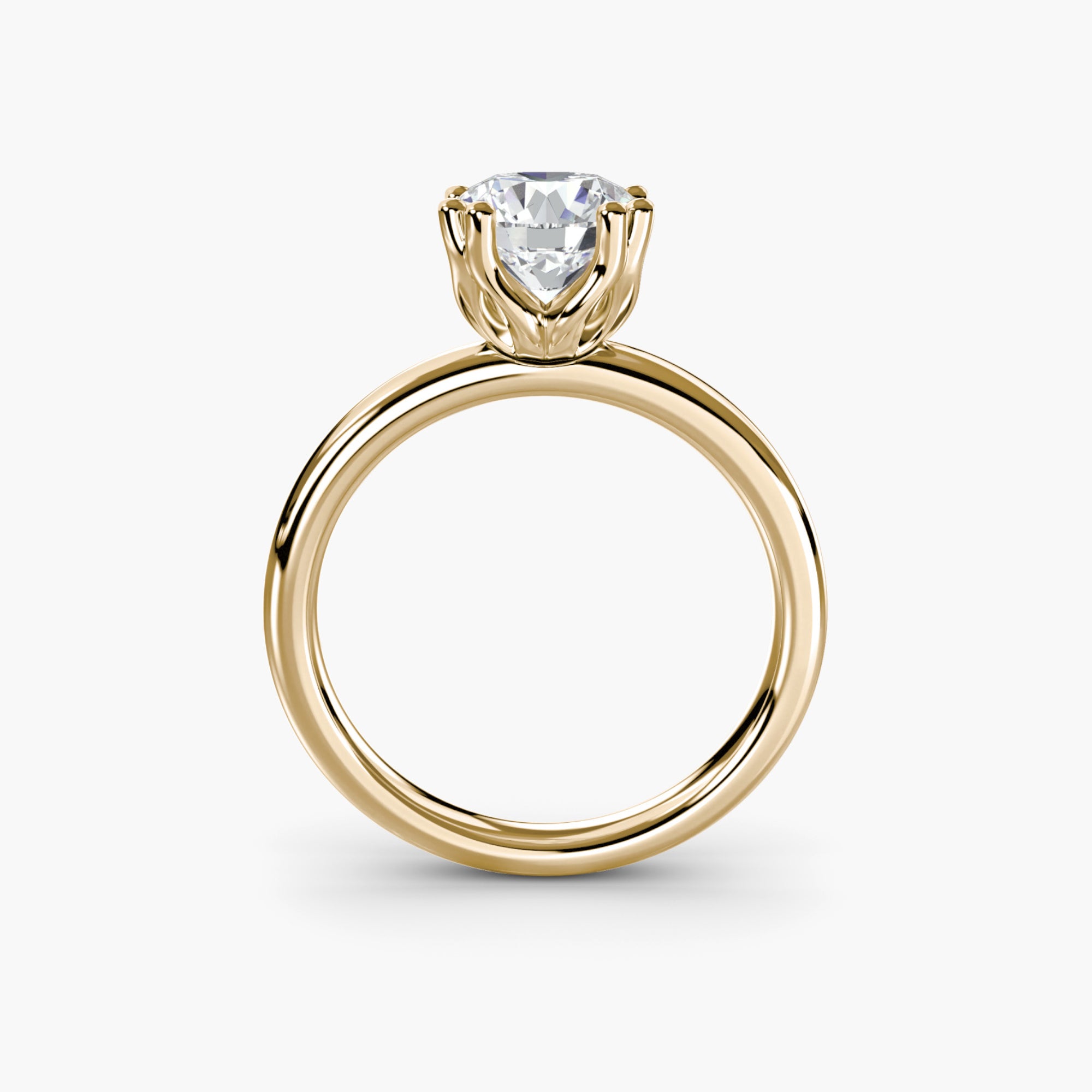Double Prong Round Solitaire ring