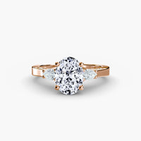 Oval With Pear Three Stome Hidden Halo Ring