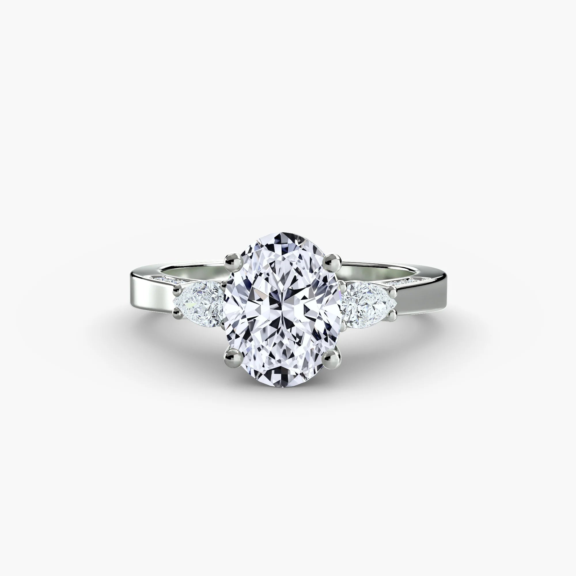Oval With Pear Three Stome Hidden Halo Ring