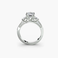 Oval With Pear Three DIamond Ring