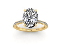Oval Diamond Set Prongs Engagement Ring with Pavé Band